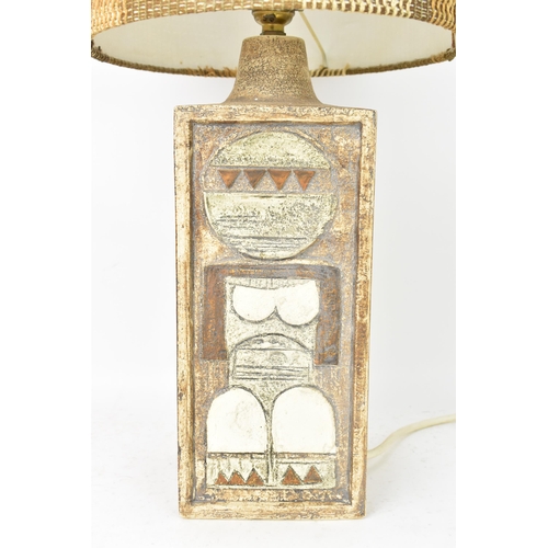 71 - A Troika pottery lamp base by Penny Black, of rectangular form with Aztec designs on a textured brow... 