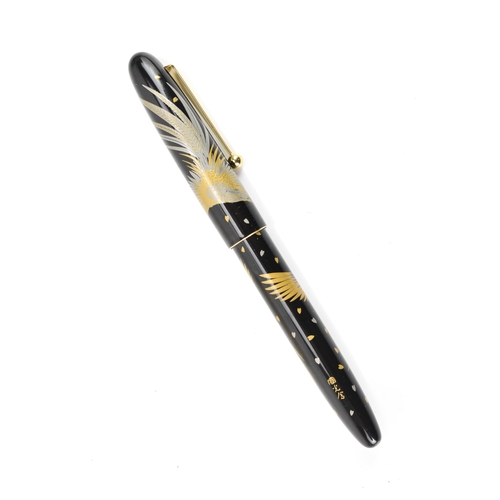 72 - A Namiki ballpoint pen, in black lacquer and relief decorated depicting phoenix birds in flight, cha... 