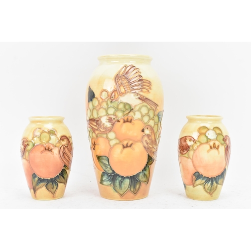 8 - Three Moorcroft pottery 'Finches Ochre' pattern vases, designed by Sally Tuffin, circa 1990, each of... 