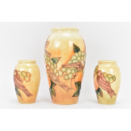 8 - Three Moorcroft pottery 'Finches Ochre' pattern vases, designed by Sally Tuffin, circa 1990, each of... 