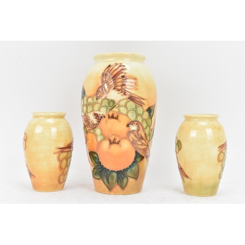 8 - Three Moorcroft pottery 'Finches Ochre' pattern vases, designed by Sally Tuffin, circa 1990, each of... 