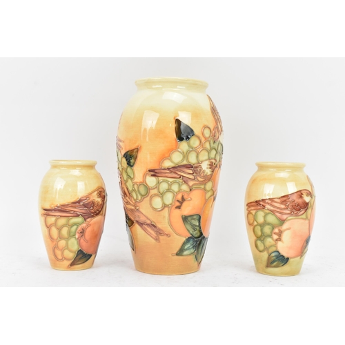 8 - Three Moorcroft pottery 'Finches Ochre' pattern vases, designed by Sally Tuffin, circa 1990, each of... 