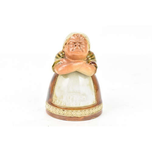 80 - Suffragette Interest - Royal Doulton stoneware figural inkwell, modelled as a lady standing with fol... 