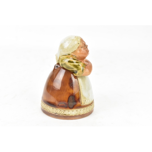 80 - Suffragette Interest - Royal Doulton stoneware figural inkwell, modelled as a lady standing with fol... 