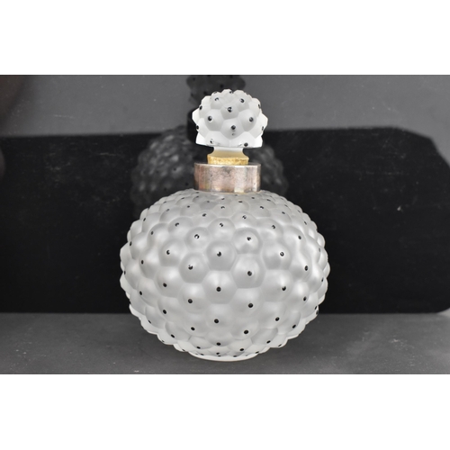 82 - A Lalique 'Cactus' frosted glass scent bottle and stopper, frosted glass with black enamel decoratio... 