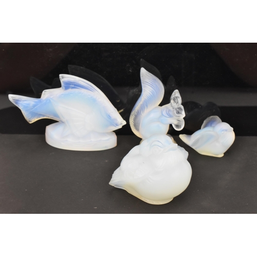 85 - Four Art Deco Sabino opalescent glass models, including a fish 7cm high x 10.5cm wide, a bird in fli... 