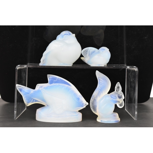 85 - Four Art Deco Sabino opalescent glass models, including a fish 7cm high x 10.5cm wide, a bird in fli... 