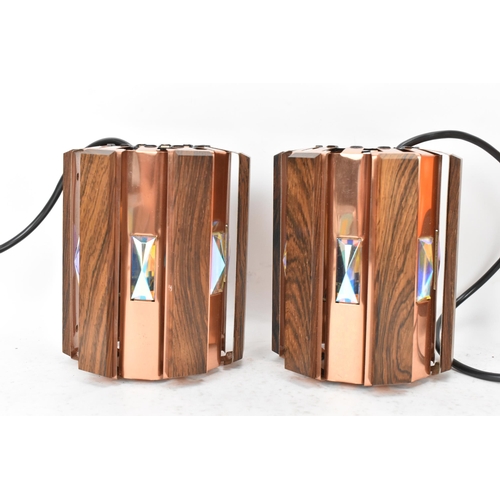 87 - A pair of 1960s Danish Werner Schou for Cornell Elektro afromosia and copper hanging lanterns, each ... 