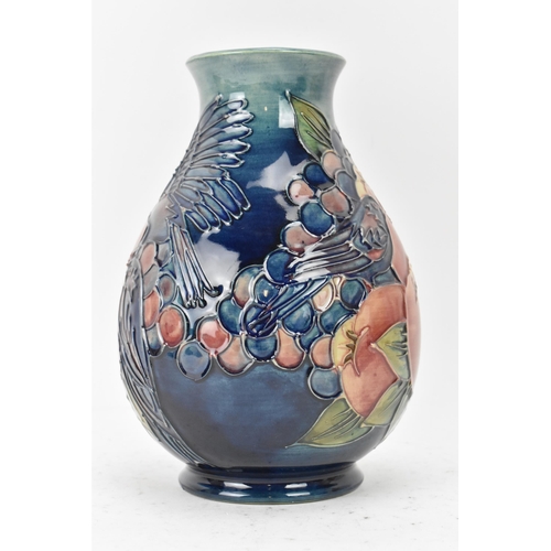 9 - A Moorcroft pottery 'Finches and Fruit' pattern vase, designed by Sally Tuffin, of baluster form wit... 