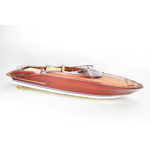 93 - A scale model of a Riva Rama speedboat, varnish finished with cream leather upholstered seats and ch... 