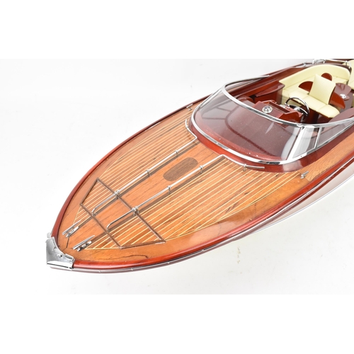 93 - A scale model of a Riva Rama speedboat, varnish finished with cream leather upholstered seats and ch... 