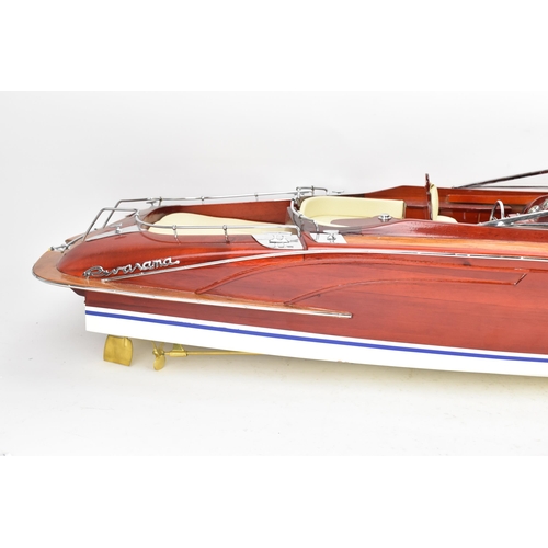 93 - A scale model of a Riva Rama speedboat, varnish finished with cream leather upholstered seats and ch... 