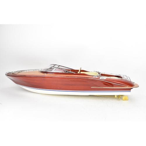 93 - A scale model of a Riva Rama speedboat, varnish finished with cream leather upholstered seats and ch... 