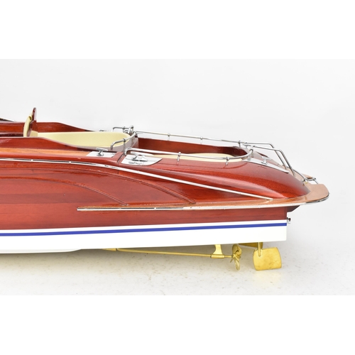 93 - A scale model of a Riva Rama speedboat, varnish finished with cream leather upholstered seats and ch... 