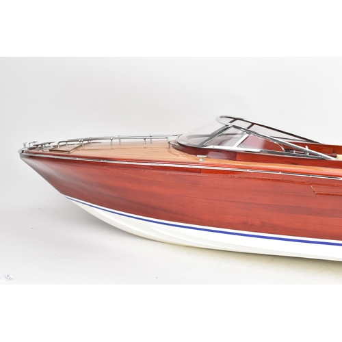 93 - A scale model of a Riva Rama speedboat, varnish finished with cream leather upholstered seats and ch... 