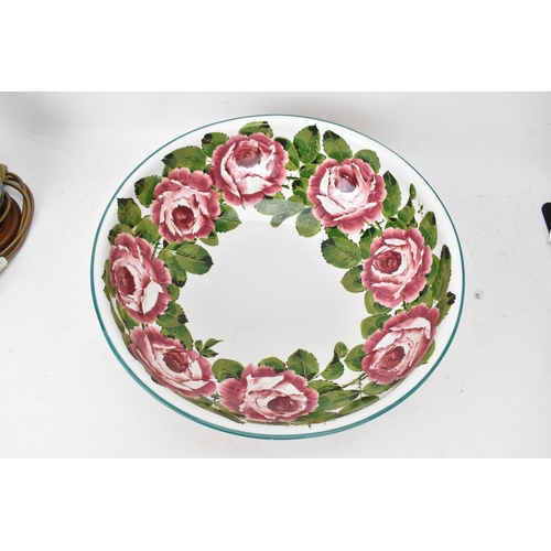 94 - An early 20th century Wemyss 'Cabbage Roses' pattern wash jug and bowl, painted in polychrome with f... 