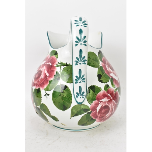 94 - An early 20th century Wemyss 'Cabbage Roses' pattern wash jug and bowl, painted in polychrome with f... 