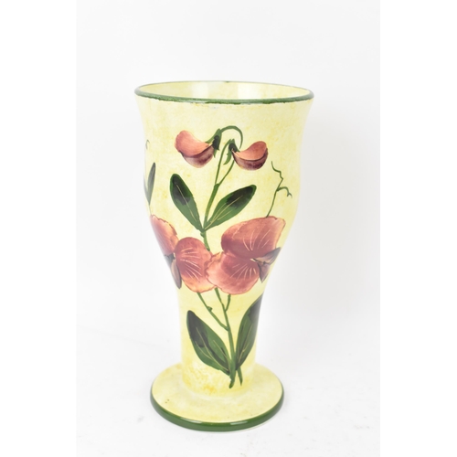 96 - A collection of Wemyss pottery to include a sang de boeuf glazed jardiniere 17.5cm high x 22cm wide,... 