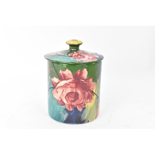 96 - A collection of Wemyss pottery to include a sang de boeuf glazed jardiniere 17.5cm high x 22cm wide,... 