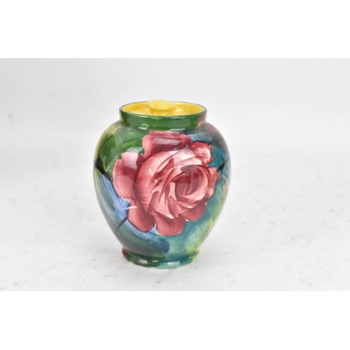 96 - A collection of Wemyss pottery to include a sang de boeuf glazed jardiniere 17.5cm high x 22cm wide,... 