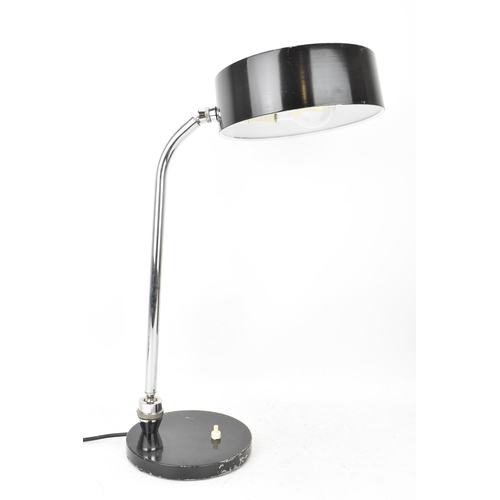 98 - A mid century modern desklamp, designed by André Mounique for French company Jumo, having a black en... 