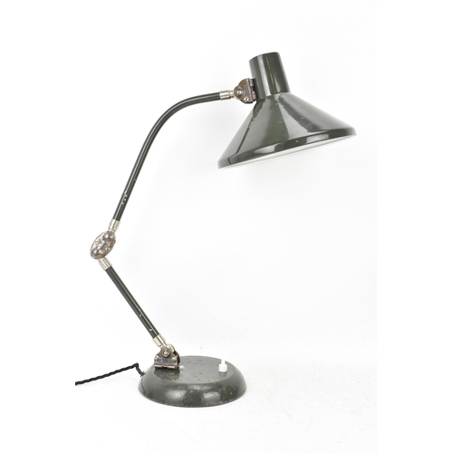 99 - A 1960s retro desklamp by the French company Jumo, model GS1, having a dark green enamelled shade, a... 