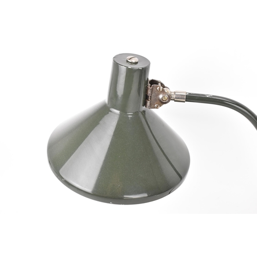 99 - A 1960s retro desklamp by the French company Jumo, model GS1, having a dark green enamelled shade, a... 