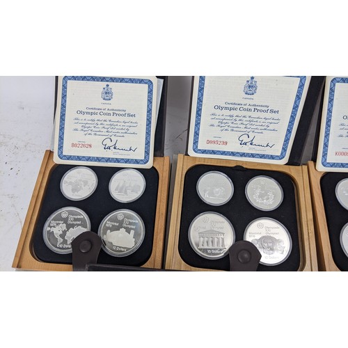 111 - 1976 Canadian Olympics Silver Proof Four-Coin Complete Set of 7, each with original box and CAO,