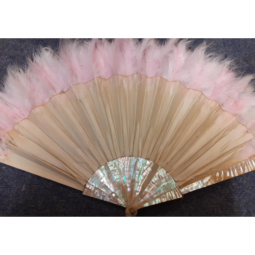 35 - Duvelleroy, Paris-A cream silk fan with pink hues having a hand-painted scene of a bird inflight bet... 