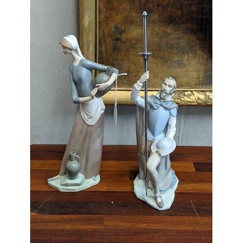 39 - Two Lladro figures to include a woman with two water jugs, and a gentleman with a sword on one knee ... 