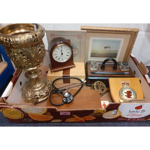 107 - Vintage household items to include a 19th Century brass oil lamp base, a stethoscope, an RAF wall pl... 