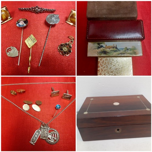 57 - A small quantity of vintage costume jewellery to include a gold tone stick pin with enamelled head h... 