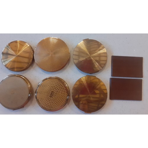 83 - A group of 6 vintage Stratton gold tone compacts to include 2 having a Cecil Golding design of a par... 