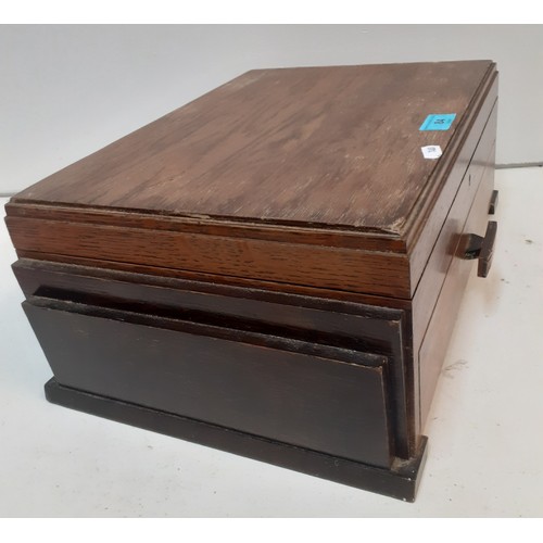 84 - An Art Deco oak jewellery box having one drawer and hinged lid, both lined in velvet, 45cm wide x 29... 