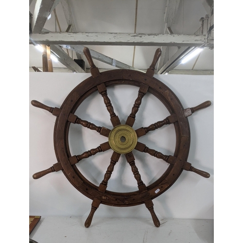 110 - A Nautical reproduction ship's wheel, 93cm dia. Location: A2B
If there is no condition report shown,... 