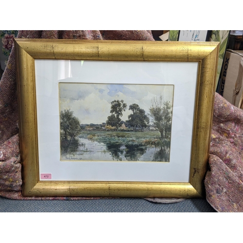 59 - A watercolour depicting a river scene with a farmyard in the background, bearing signature 'Frank Th... 