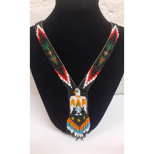 47 - A quantity of ethnic and Native American inspired bead jewellery, mainly necklaces and bracelets tog... 