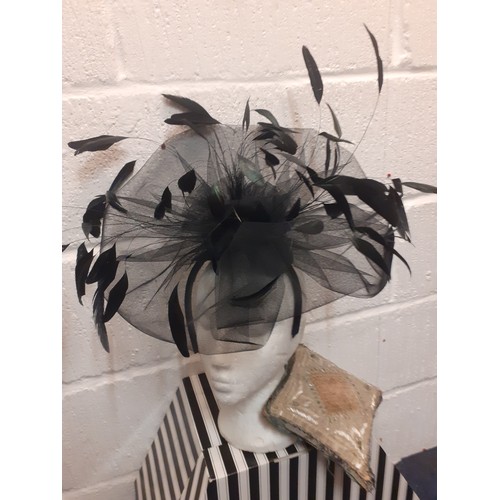 103 - A modern Francis Heeley black fascinator with feather and net detail together with a vintage beaded ... 