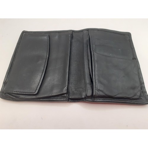 48 - A black polished stingray skin wallet with black leather interior. Location: BWR
If there is no cond... 