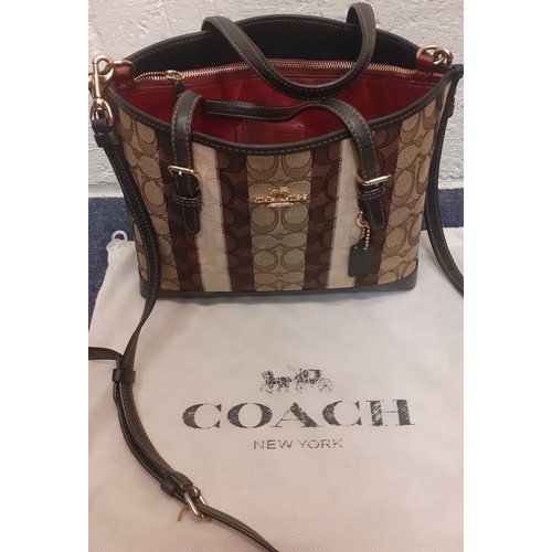 2 - Coach-A 'Mollie' tote in brown signature jacquard vertical stripe design, having detachable shoulder... 