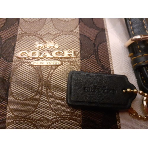 2 - Coach-A 'Mollie' tote in brown signature jacquard vertical stripe design, having detachable shoulder... 