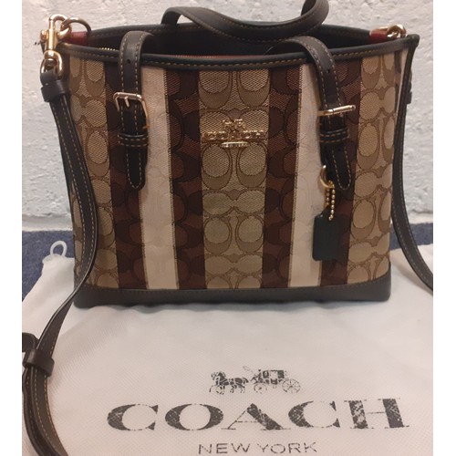 2 - Coach-A 'Mollie' tote in brown signature jacquard vertical stripe design, having detachable shoulder... 