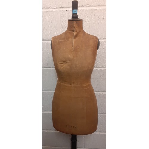 26 - A vintage Levine tailors dummy A/F having brown cloth body on a black lacquered adjustable frame, mi... 