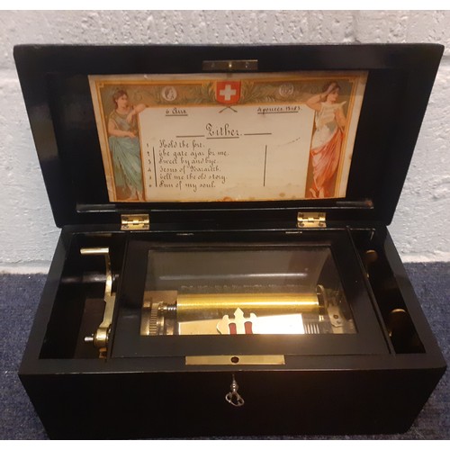 27 - A Paillard Vaucher Fils music box playing six sacred airs in a black lacquered case with Chinoiserie... 