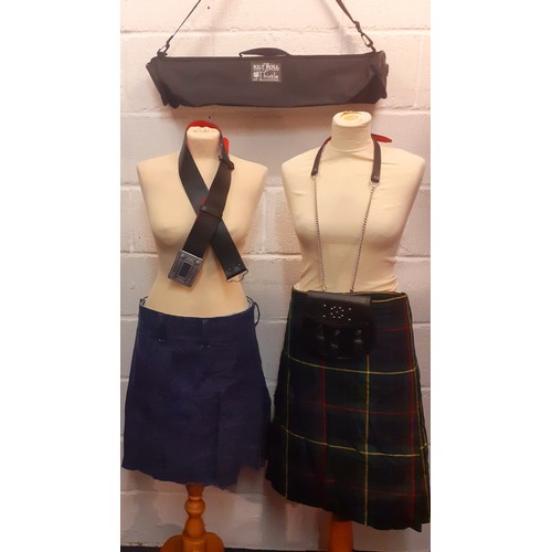 46 - Two kilts, one tartan and one denim together with a Scottish black belt with silver tone buckle, a k... 