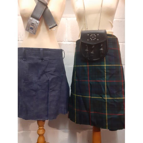 46 - Two kilts, one tartan and one denim together with a Scottish black belt with silver tone buckle, a k... 