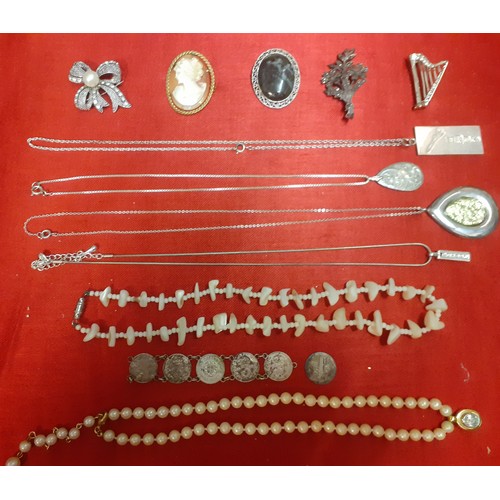 104 - A quantity of mainly vintage costume jewellery to include a silver Concorde ingot pendant on a silve... 