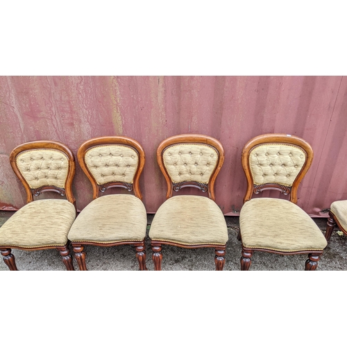 188 - A set of six Victorian mahogany upholstered back dining chairs with baluster turned, reeded legs
Loc... 