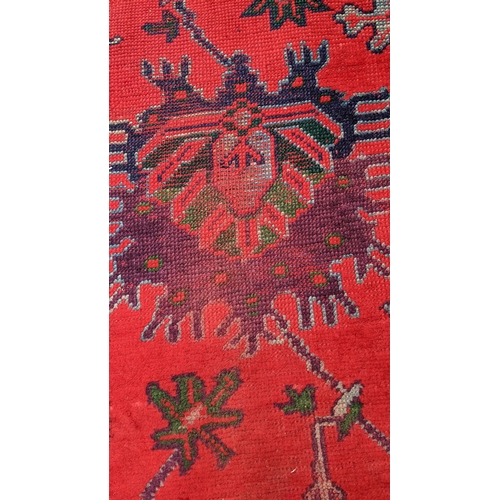 192 - A Turkish runner with geometric motifs on a red ground, 360cm h x 95cm w
Location: BB
If there is no... 