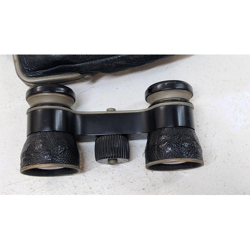 199 - Busch opera glasses in a black leather case
Location: CAB 1
If there is no condition report shown, p... 